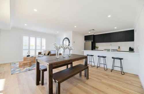 Orange House | Getaway on Curran | CBD Escape, EV Plug, Firepit