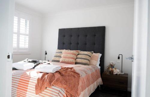 Orange House | Getaway on Curran - CBD Escape, EV Plug, Firepit