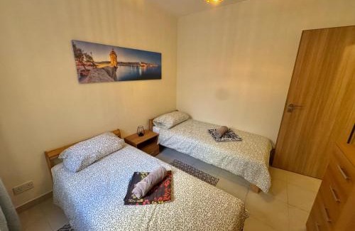 Għadira Apartment | Ghadira Breeze - Family and Couple friendly Sea View