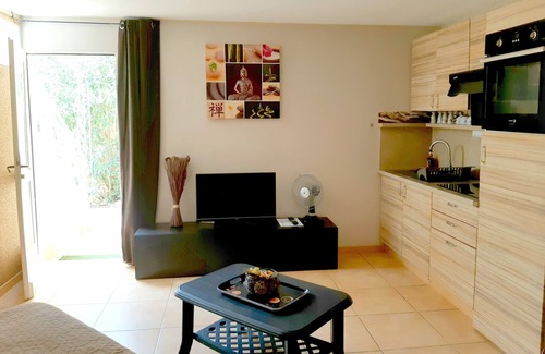 Argeles-sur-Mer Apartment | Gite saint julien in rez of garden with terrace swimming pool and games.