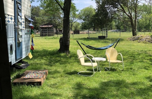 Cranston House | Glamping with sheep in a renovated 1972 Ace camper on 48 acres
