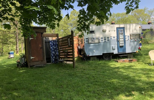Cranston House | Glamping with sheep in a renovated 1972 Ace camper on 48 acres