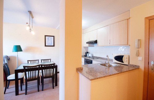 Playa de Almarda Apartment | Global Properties: Apartment with swimming pool in Corinto Beach