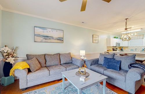 Central Myrtle Beach Condo | Golf-club adjacent condo with a washer/dryer, elevator, & on-site pool