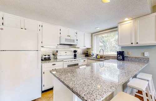 Ocean Ridge Cottage | Golf course-front beach home with full kitchen - close to the beach