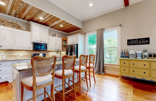 Covington House | Gorgeous home half a mile from Covington Square with streaming, golf cart, & AC