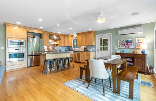 North Lake George House | Gorgeous lakeview retreat with wraparound porch, wood stove, & WiFi - dogs OK