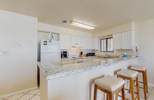 Crystal Beach Condo | Gorgeous, Open Ground Floor Condo Gulf Front w/Large Patio. Beach Access