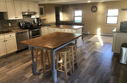 Rochert House | Gorgeous sunsets and a sugar sand beach in the heart of lakes country await you!