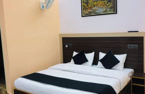 Sidhpur Hotel | Goroomgo Paradise Inn Dharmsala