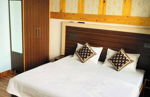 Sidhpur Hotel | Goroomgo Paradise Inn Dharmsala