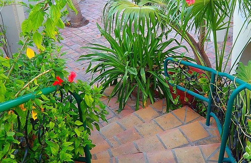 Cockburn Town House | Grand Turk Vibes - Balcony double queen room with partial ocean view!
