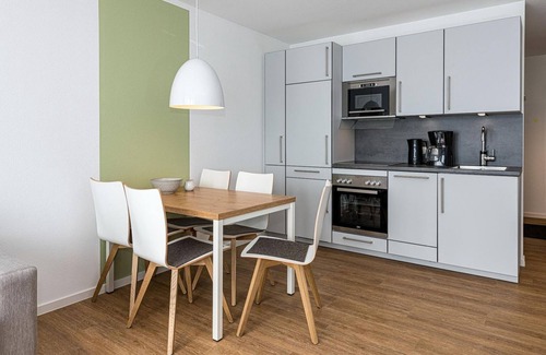 Bensersiel Apartment | Great North Sea apartment with balcony, parking, use of swimming pool & sauna -