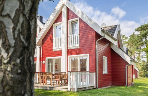 Glowe House | Great vacation home with south-facing terrace, sauna, whirlpool bath, wood-burning stove & parking space