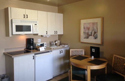 Canyon Corridor Apartment | Great value! Jr. Villa for 2 in famous Palm Canyon Resort. Kitchenette. From 159