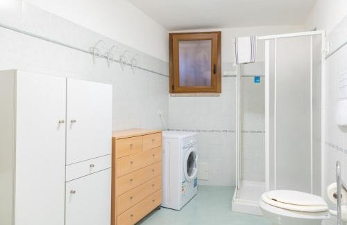 Monte Petrosu Apartment | Green Oasis - 2 Min Walk from Cala Girgolu