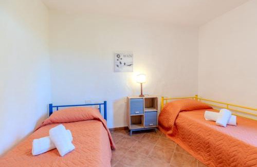 Monte Petrosu Apartment | Green Oasis - 2 Min Walk from Cala Girgolu