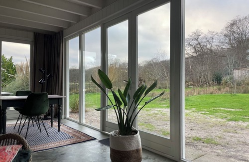 Municipality of Bergen Ski Chalet | Greenhouse on 3000m2 private nature area nearby the dunes 3km from the sea