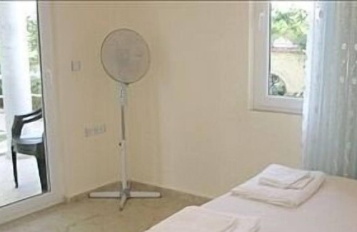 Fethiye City Center Apartment | Ground Floor Apartment With Shared Pool And Gardens