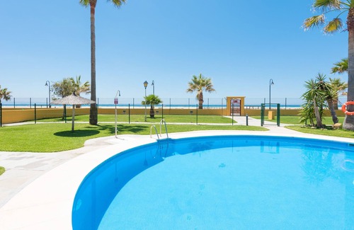 Bolonia Apartment | Ground floor beachfront, shared pool