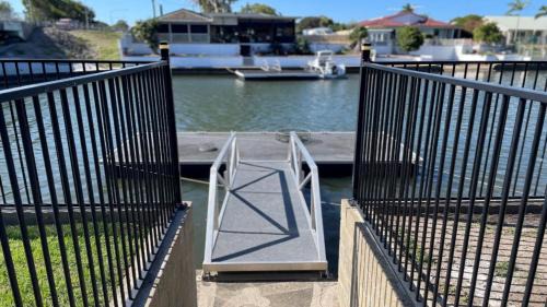 Bongaree House | Ground floor, family unit on the canal with free WIFI!
