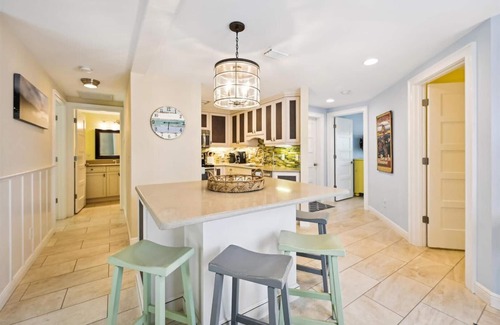 Holmes Beach Cottage | Ground Floor Two Bedroom Island Styled Home on Beautiful Anna Maria. Close to Beaches!
