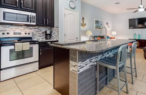 Corpus Christi House | Ground level condo near beach with a deck, washer/dryer AC & Pool