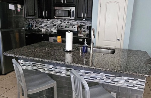 Corpus Christi House | Ground level condo near beach with a deck, washer/dryer AC & Pool
