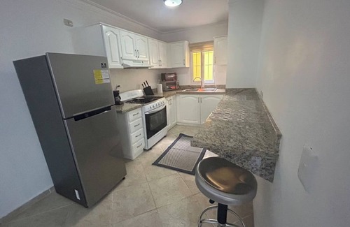 La Esplanada Apartment | Guest-friendly condo with pool in central Sosua
