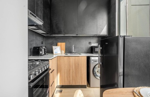 Jumeirah Village Circle Apartment | GuestReady - Arabic Charm | Balcony | Regina Tower