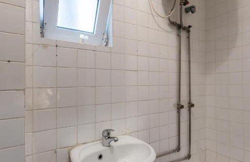 Bonfim Apartment | GuestReady - Over the rooftop