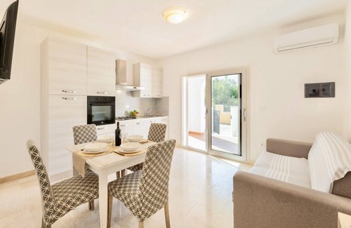 Orosei Apartment | Gulf of Orosei Three-room apartment sleeps 5 with air conditioning