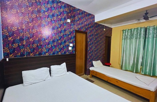 Sualkuchi Hotel | H K Residency Near Kalakshetra
