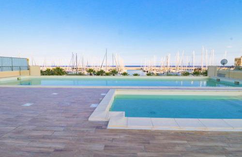 Santo Stefano al Mare Apartment | H11 [Luxury 12B] Porto - Piscina - Jacuzzi
