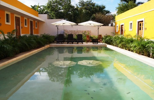 Barrio de Santiago Hotel | Habitación de lujo con king Size en el centro de Mérida.