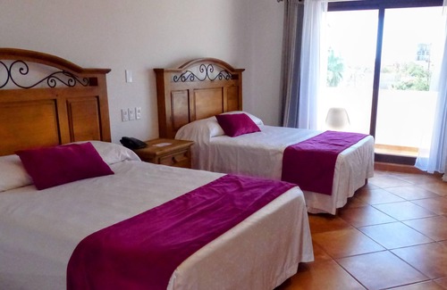 Esterito Hotel | Hacienda Bugambilias