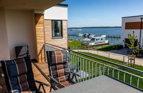 Schwerin Apartment | Hangar 19 Luxusapartment mit Sauna, Kamin und Seeblick H4W3