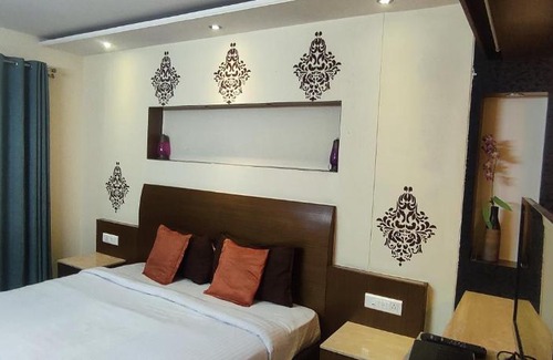Gokulam Apartment | Happy Vibes studio flats - service apartment