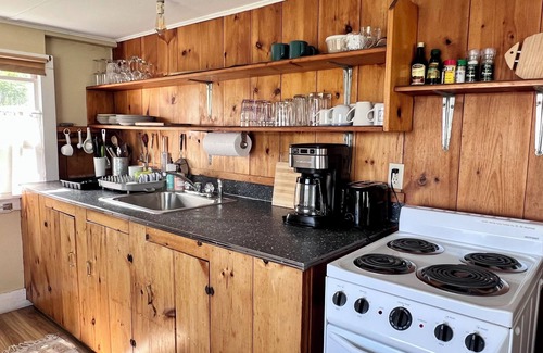 New Harbor Cabin | Harborside cabin with dock overlooking lobster boats