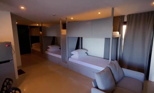 Yapak Apartment | Harzel Apartelle - Suites and Serviced Apartments