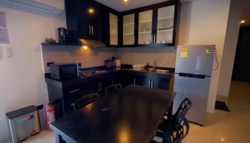 Yapak Apartment | Harzel Apartelle - Suites and Serviced Apartments
