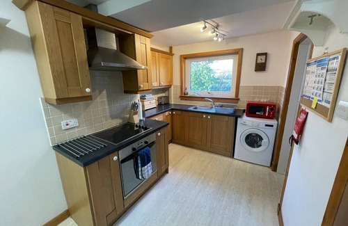 Torrin Cottage | HAWTHORN DENE, pet friendly, cosy croft cottage with mountain views in Torrin