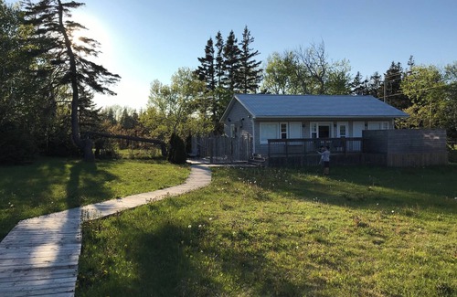 York Cottage | Hear the ocean from spacious, pet friendly cottage, a stones throw from beach!