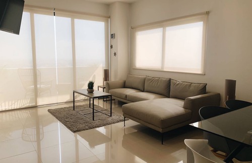 Zona Dorada Apartment | Hermoso Departamento con Gran Vista al mar a 5 min de la Playa