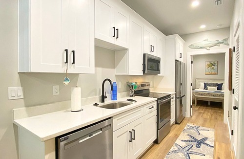 Port St. Joe Cottage | "Heron Cottage" is a pet friendly, 1 bed, 1 1/2 bath unit accommodating 4 guests. Community Pool.
