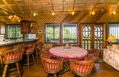 Sunnyside House | HGTV-Tropical Island Pool Home with Casita & 400 Foot Dock