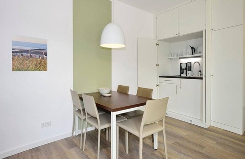 Wangerooge Apartment | High-quality apartment on the North Sea beach with sunny south-facing balconies and beach chair
