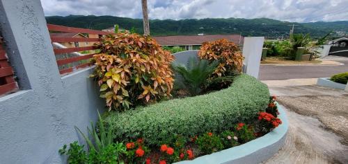 Montego Bay House | Hillside Retreat in Gated Community Close to Beach
