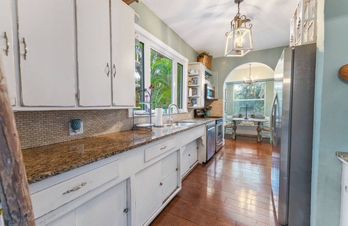 Valencia Terrace House | Historic 1920's spanish-style home just off Palm tree lined McGregor Blvd