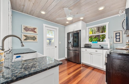 Stuart House | Historic 1935 home directly on the River! 167' New Dock, Walk to Downtown, Pool